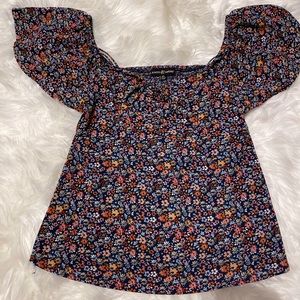 Almost Famous Cut Out Flower Blouse